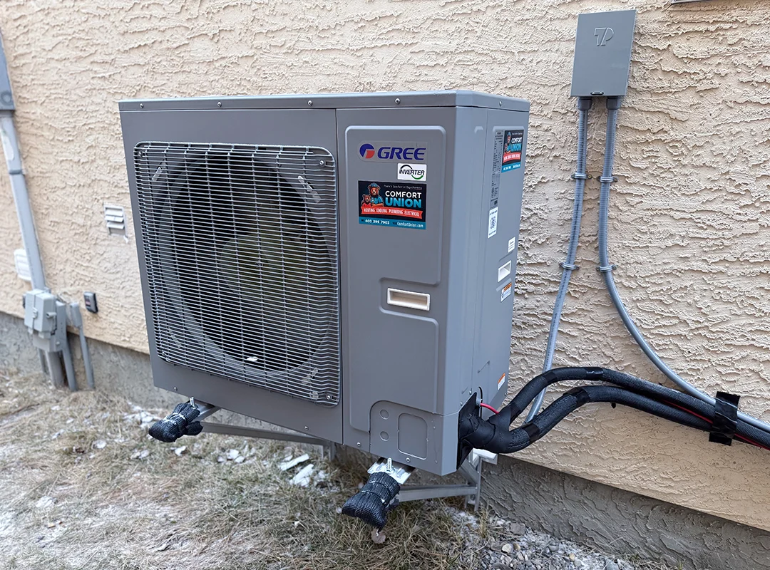 Gree Heat Pump installed by Comfort Union outside a residential home