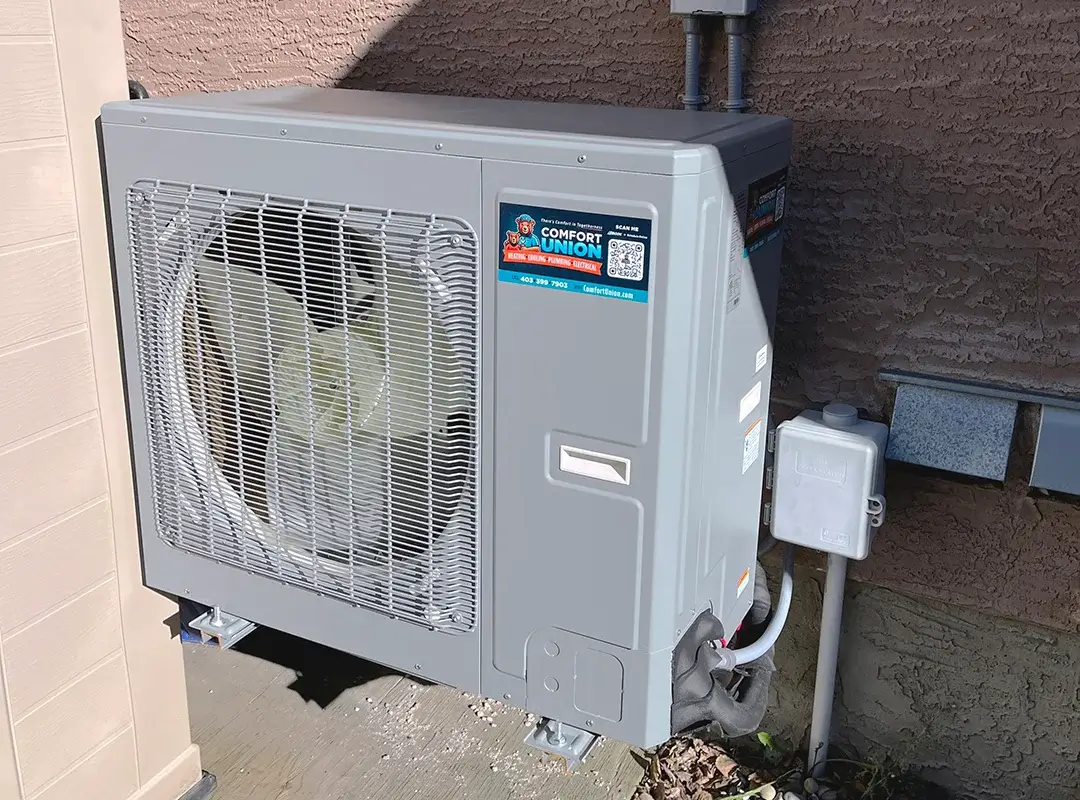 Heat pump installed outside residential home – fully operational after installation