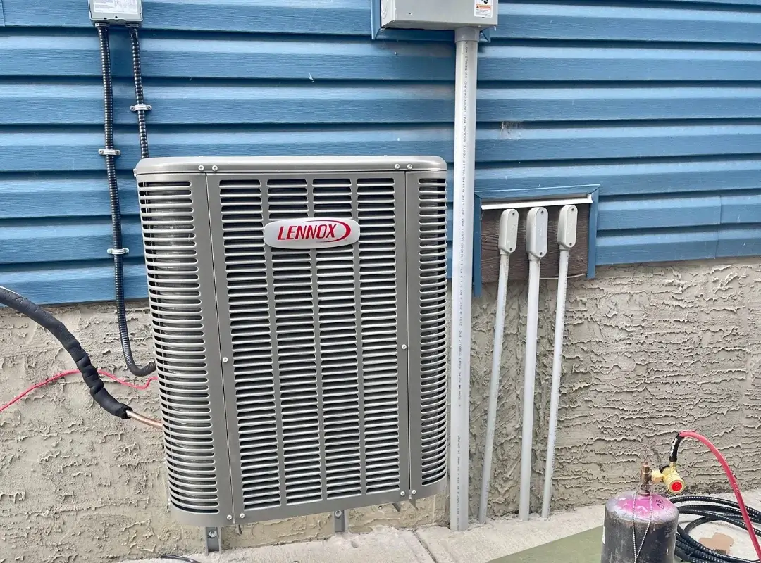 Lennox air conditioner installed outside home – energy-efficient cooling solution